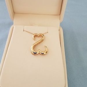 Jane Seymour open heart necklace